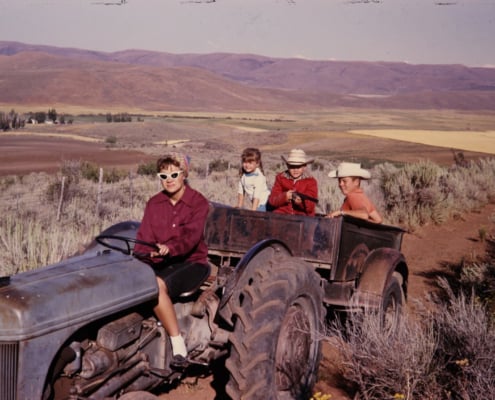 a group of people on a tractor
