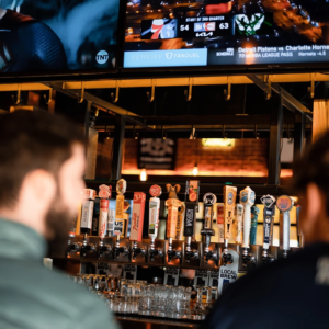 guys having beers at Ruby's Bar & Grill