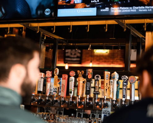 guys having beers at Ruby's Bar & Grill