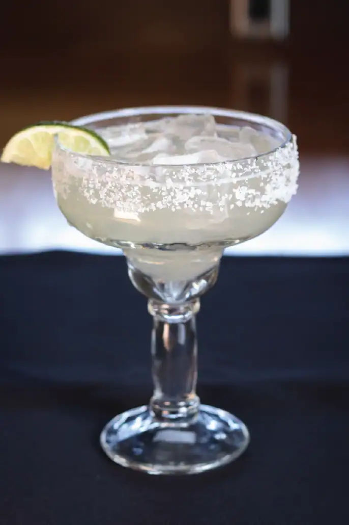 A margarita with lime and salt on top